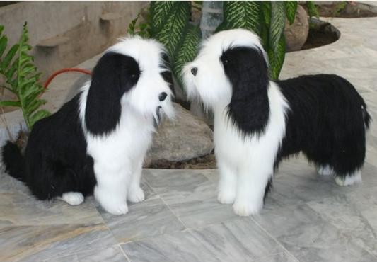 Мягкая игрушка собака Hansa Овчарка сидящая искусственный мех белый черный 75 см