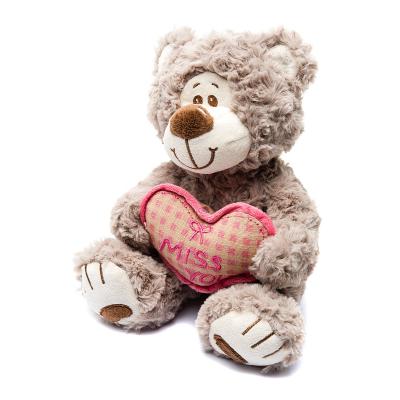 Мягкая игрушка медведь Fluffy Family Митя с сердцем текстиль искусственный мех бежевый 23 см 6927556811444